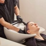 male-hairdresser-washing-toning-shampoo-out-of-cli-2025-03-26-00-30-21-utc-e1765179988265.jpg